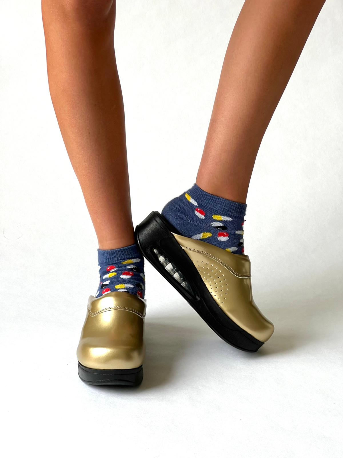 Airmeds solid gold lacquer clogs