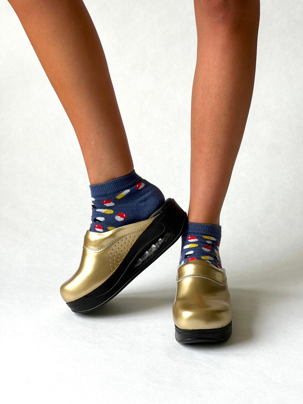 Airmeds solid gold lacquer clogs