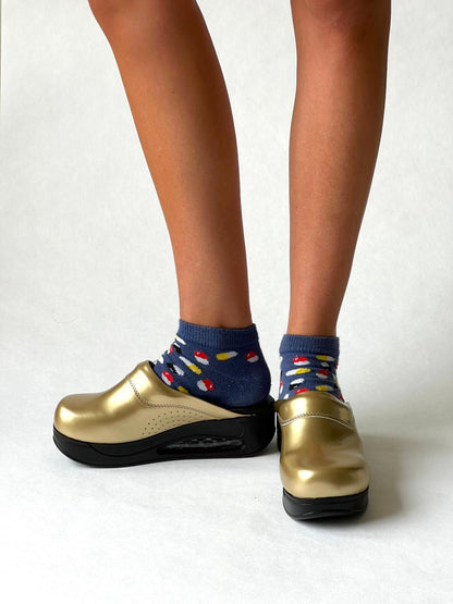 Airmeds solid gold lacquer clogs