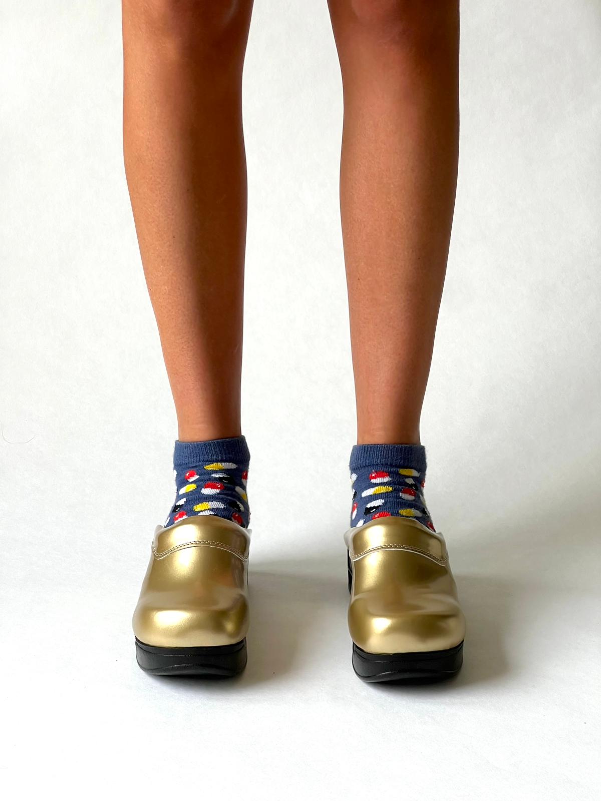Airmeds solid gold lacquer clogs