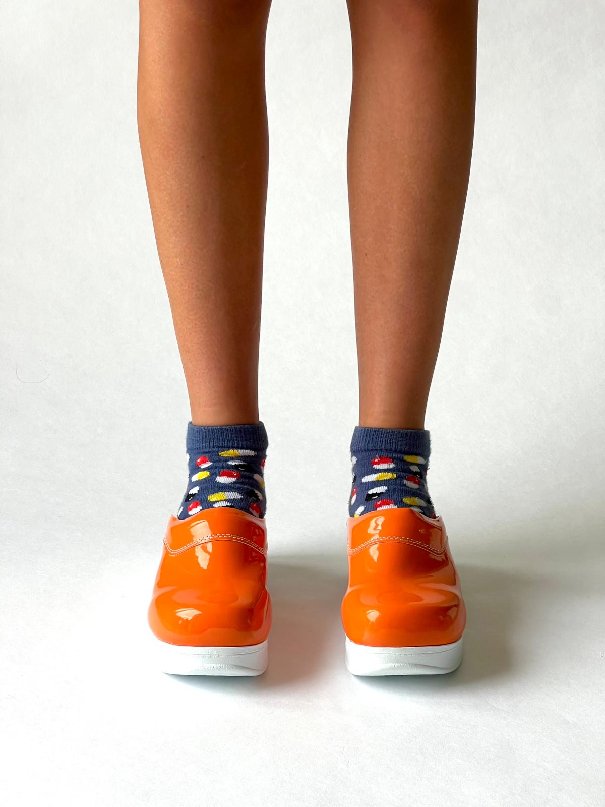 Airmeds solid orange lacquer clogs